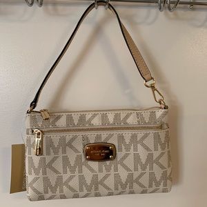 Michael Kors clutch. Brand new!! Tags still on